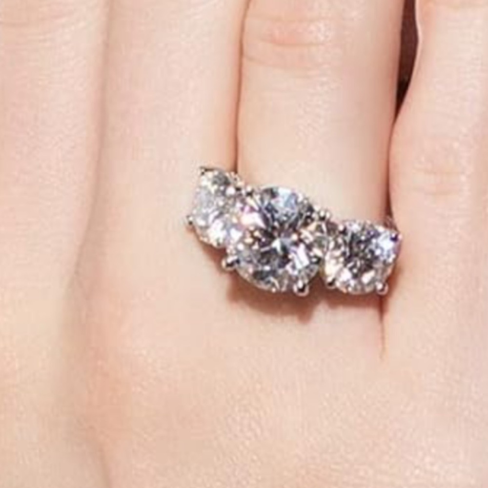 A Moissanite incredibly beautiful ring. Pictures do not do justice.